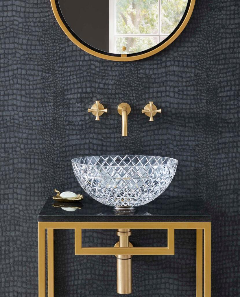 London Basin Company's latest addition to their collection of porcelain basins, the 'Lucia', hand-cut using the finest Bohemian crystal, is available in three sparkling colorways - clear, blue, and green - and adds a dramatic touch to any bathroom or cloakroom.